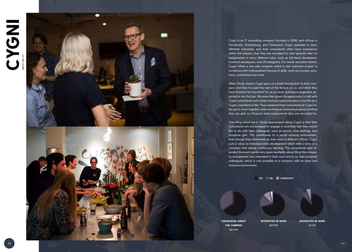 Group of colleagues in an informal gathering, some standing and talking while others are seated around a table filled with food.